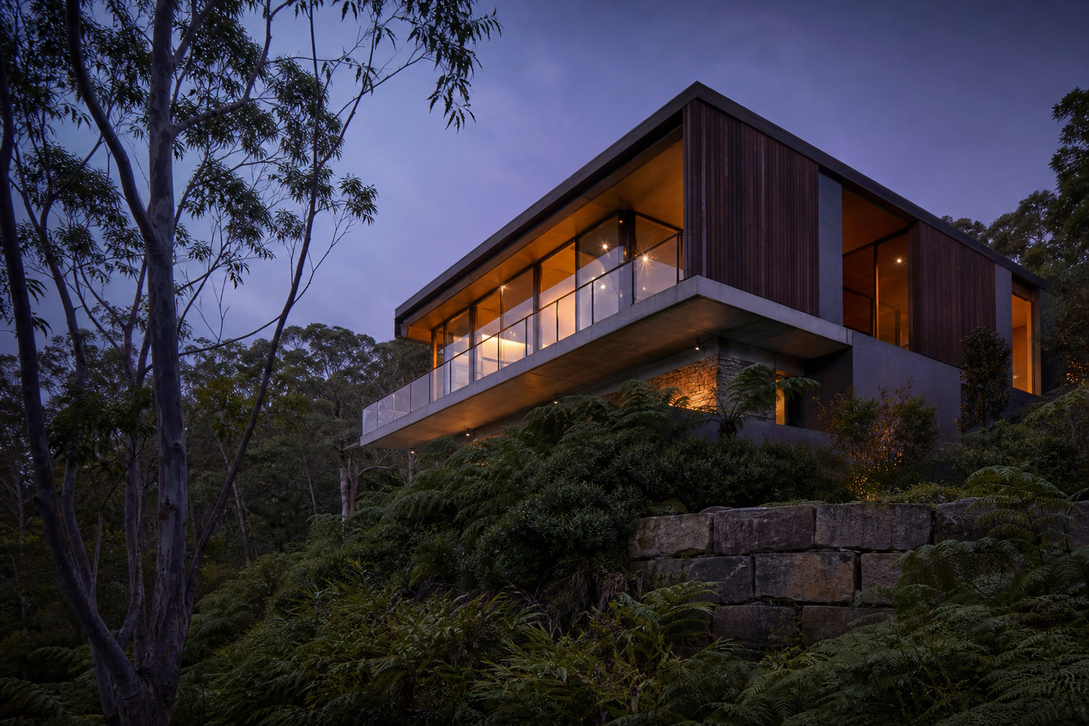 Sydney residence cantilevered into bushland at blue hour